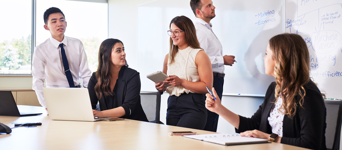 students in board room