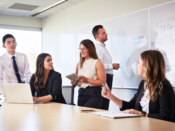 students in board room