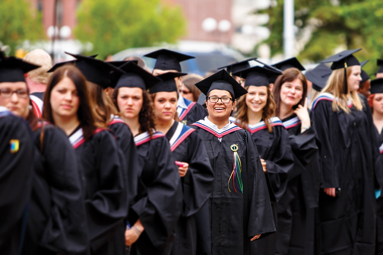 students in line at graduation