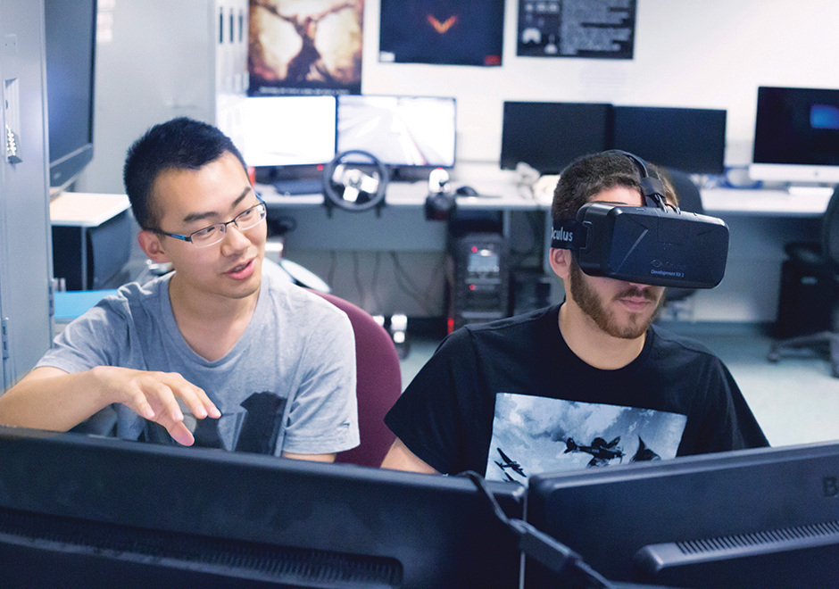 students in computer lab wearing vr headset