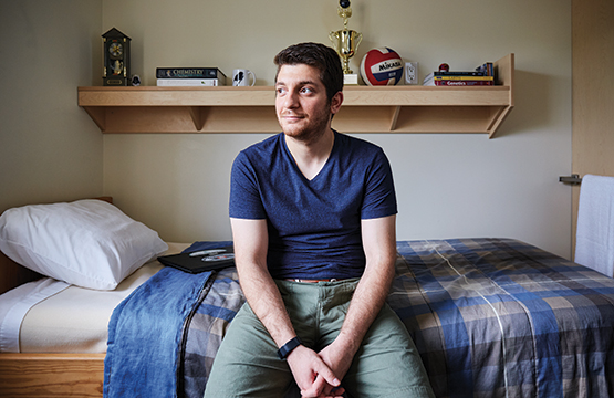 student in dorm room