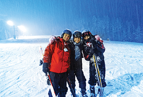 students skiing at night
