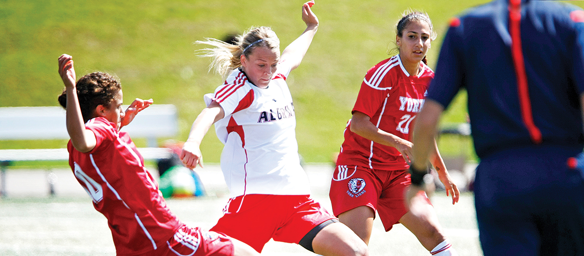 students playing soccer