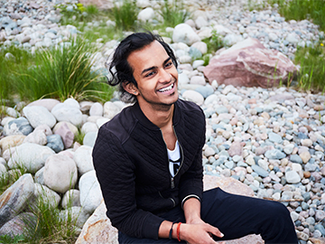 student laughing outside