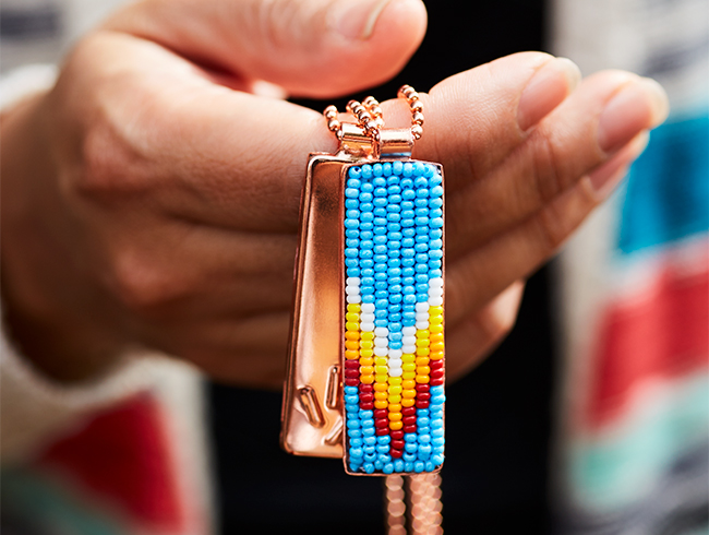 hand holding traditional jewelry