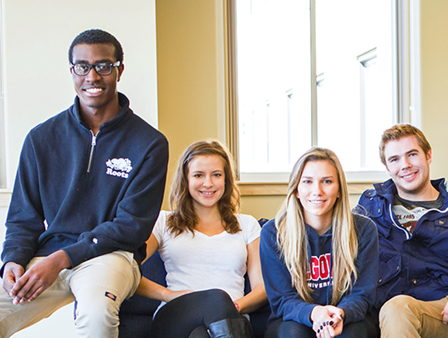 students sitting on couch