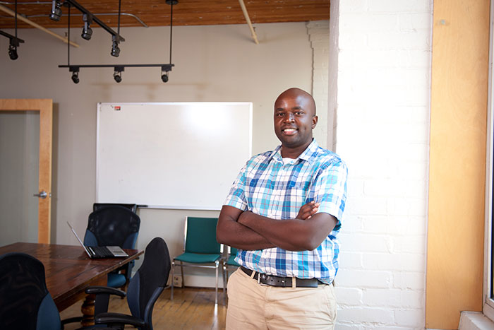 man standing in board room
