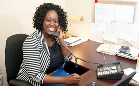woman in office on phone