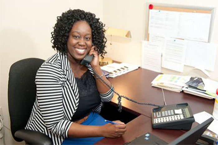 woman in office on phone