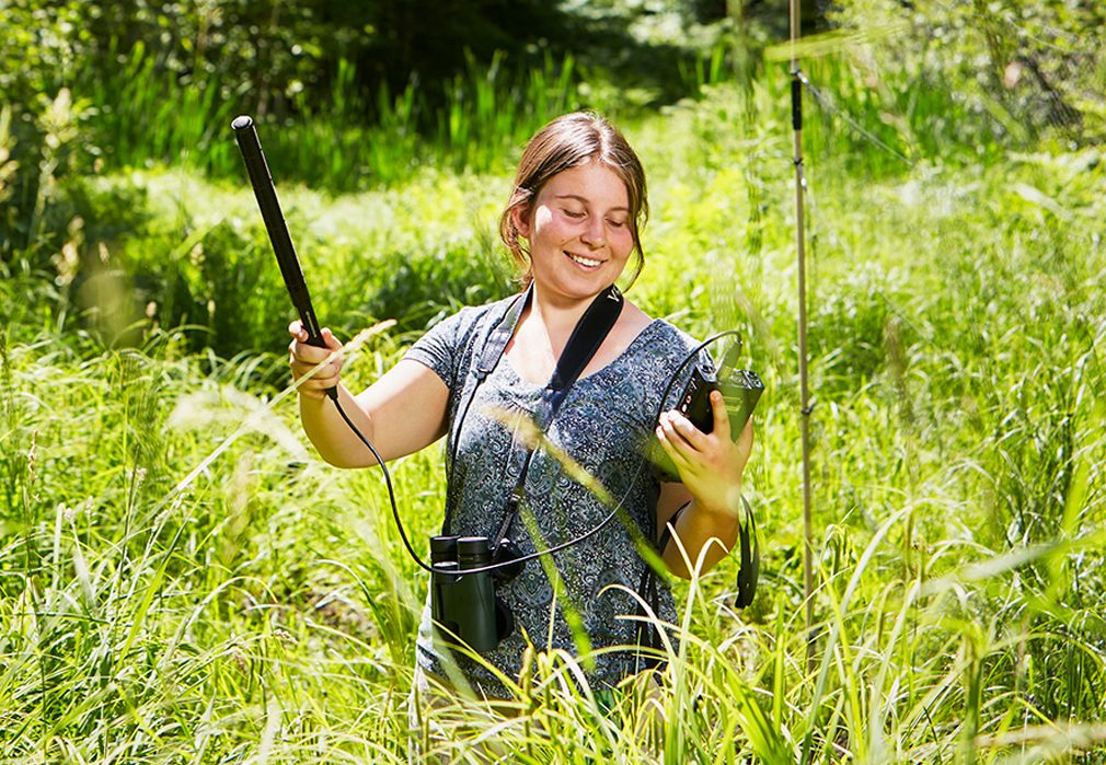 student doing science experiment outdoors