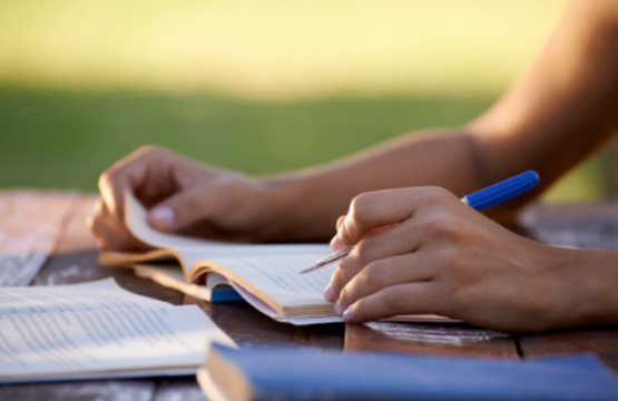 Hand writing in notebook