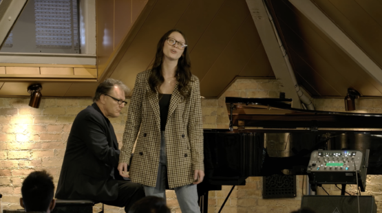 Music Student Singing on Stage