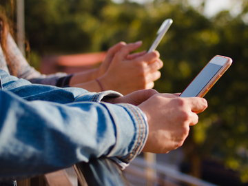 student on cell phone