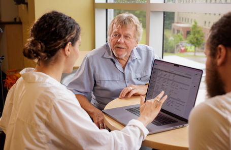 Student and employer collaborating on work