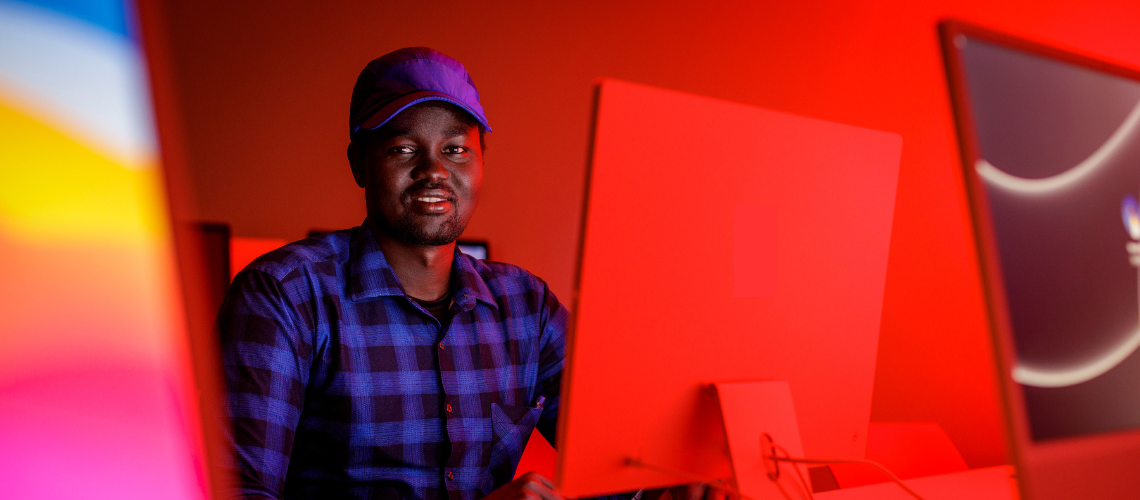 Graduate student on computer