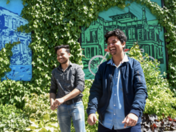 two students smiling