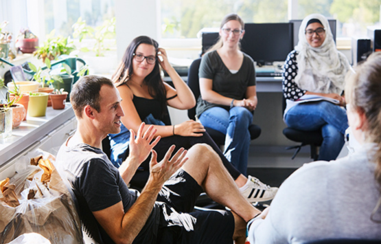 Faculty interacting with students