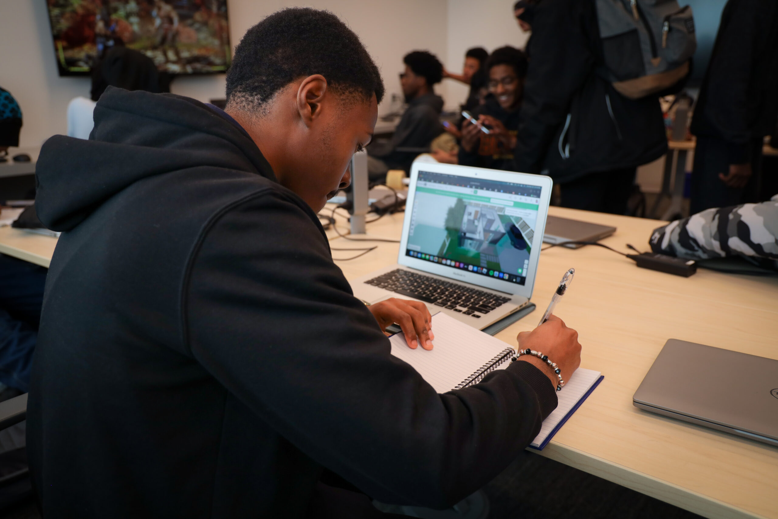 student at laptop LEAP