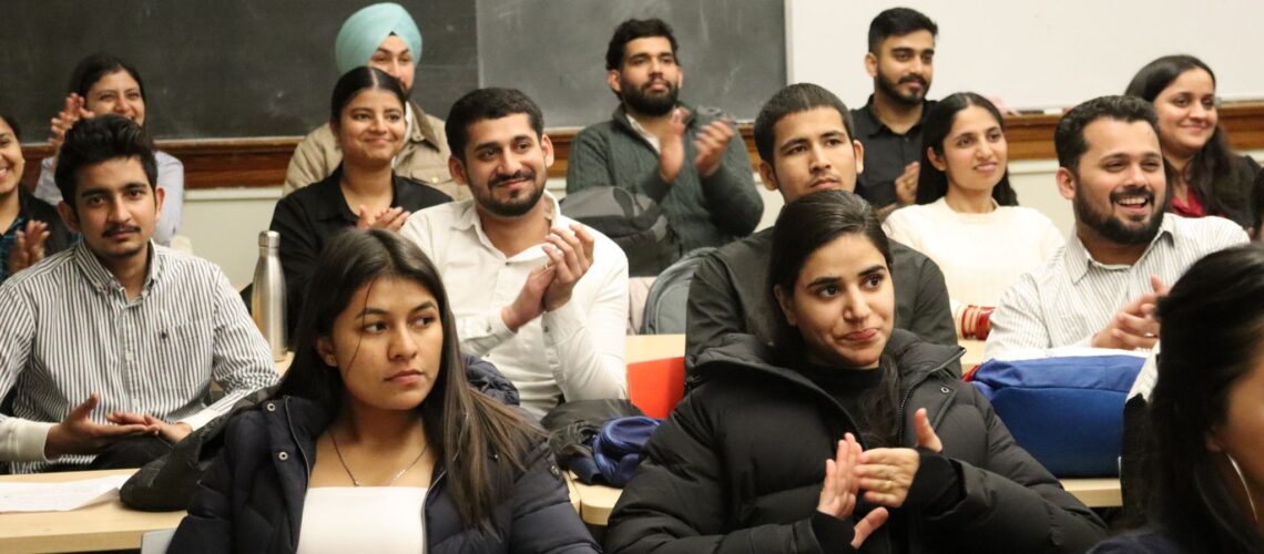 Students at the Grace Court Presentations applauding the presenters.